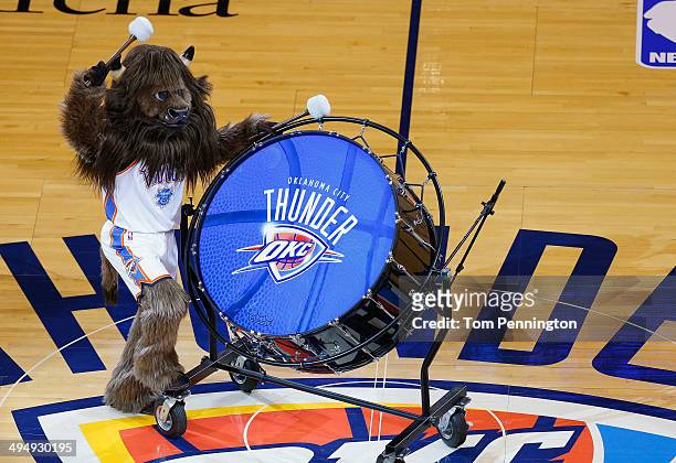 Oklahoma City Thunder mascot Rumble the Bison bangs a drum before the start of their Game Six against the San Antonio Spurs in the Western Conference...