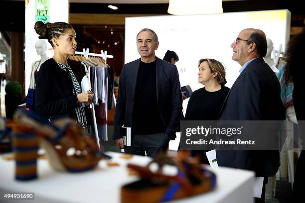 Designer Susana Traca speaks to President of Camera Moda and CEO of Costume National Carlo Capasa, Fendi designer Silvia Venturini Fendi, and CEO of...