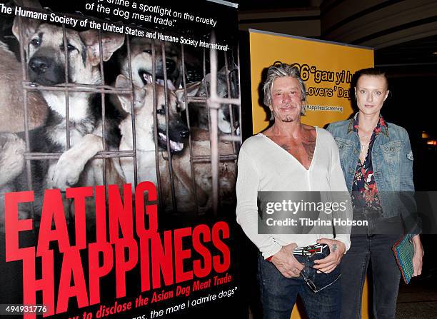 Mickey Warrick and Anastassija Makarenko attend a screening of 'Eating Happiness' presented by World Dog Alliance at Pacific Theatre at The Grove on...