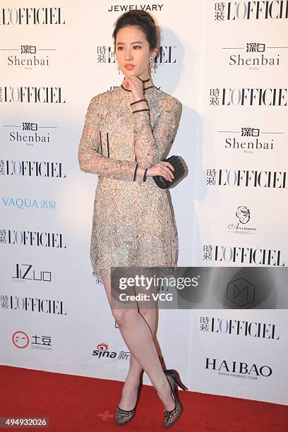 Actress Liu Yifei arrives at the red carpet of L'Officiel 2015 China Elegant Ceremony on October 29, 2015 in Beijing, China.