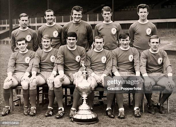 The Liverpool team with the 1st Division Championship trophy, circa August 1966. Back row, left to right: Gordon Milne, Gerry Byrne, Tommy Lawrence,...