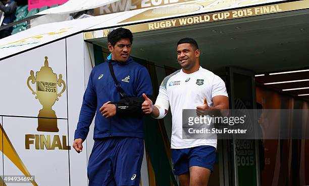 Australia players Will Skelton and Scott Sio share a joke as they make their way onto the field during the Australia Captain's Run ahead of the World...