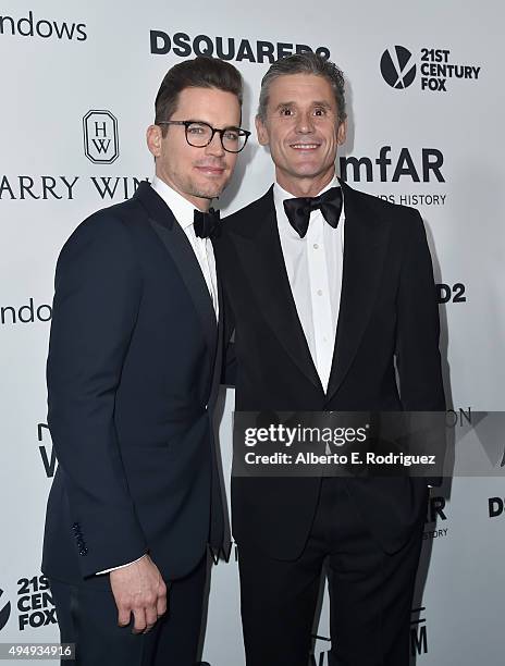 Actor Matt Bomer and Simon Halls attends amfAR's Inspiration Gala Los Angeles at Milk Studios on October 29, 2015 in Hollywood, California.