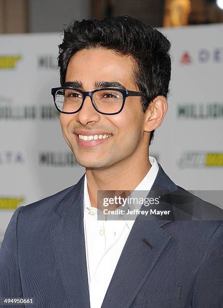 Actor Suraj Sharma arrives at the Los Angeles premiere of 'Million Dollar Arm' at the El Capitan Theatre on May 6, 2014 in Hollywood, California.