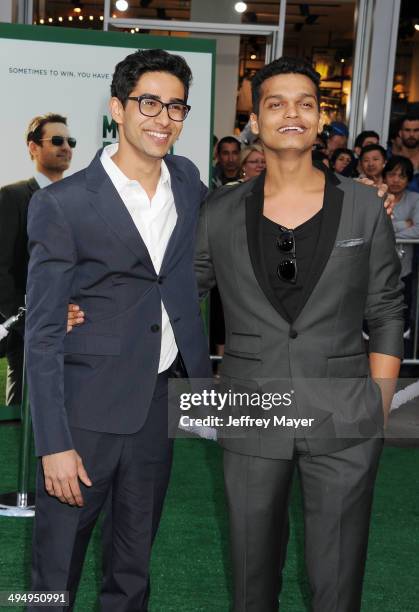 Actors Suraj Sharma and Madhur Mittal arrive at the Los Angeles premiere of 'Million Dollar Arm' at the El Capitan Theatre on May 6, 2014 in...