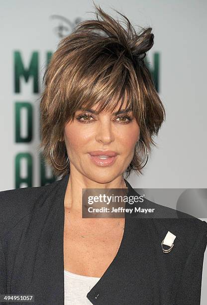 Actress Lisa Rinna arrives at the Los Angeles premiere of 'Million Dollar Arm' at the El Capitan Theatre on May 6, 2014 in Hollywood, California.