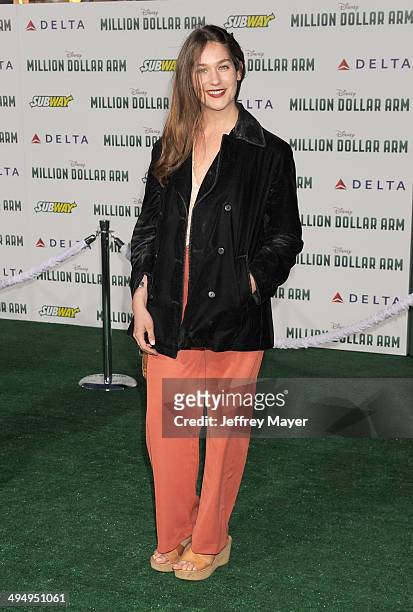 Actress Lola Kirke arrives at the Los Angeles premiere of 'Million Dollar Arm' at the El Capitan Theatre on May 6, 2014 in Hollywood, California.