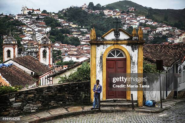 Man stands in Ouro Preto, Minas Gerais state, Brazil on April 2, 2015.