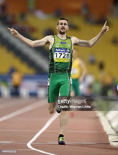Michael McKillop of Ireland celebrates winning the men's 1500m T37 final during the Evening Session on Day Nine of the IPC Athletics World...