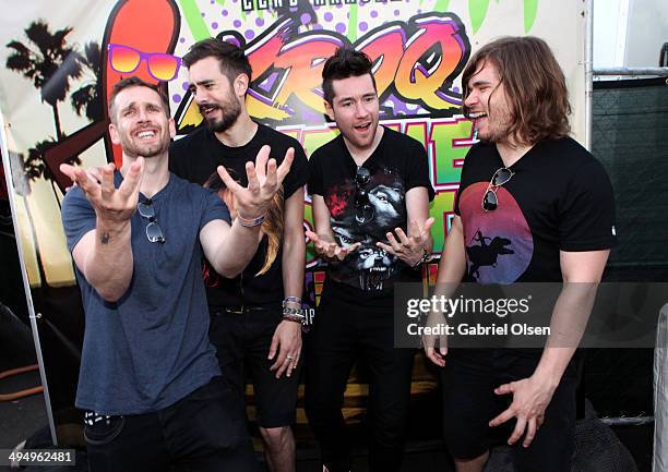 Musicians Will Farquarson, Kyle Simmons, Dan Smith and Chris "Woody" Wood of Bastille pose backstage during the 22nd Annual KROQ Weenie Roast at...