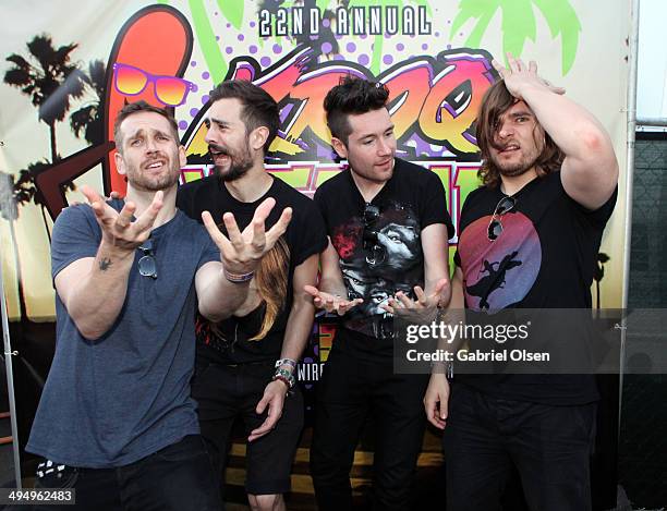 Musicians Will Farquarson, Kyle Simmons, Dan Smith and Chris "Woody" Wood of Bastille pose backstage during the 22nd Annual KROQ Weenie Roast at...