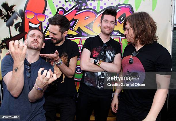 Musicians Will Farquarson, Kyle Simmons, Dan Smith and Chris "Woody" Wood of Bastille pose backstage during the 22nd Annual KROQ Weenie Roast at...