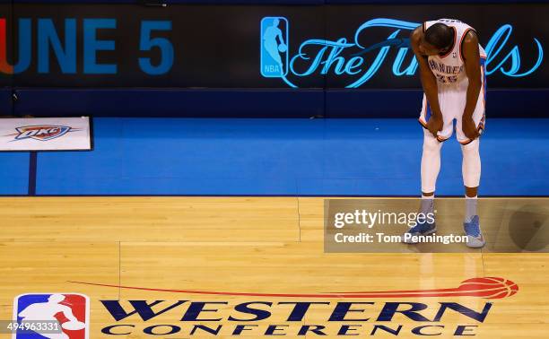 Kevin Durant of the Oklahoma City Thunder waits on the court in the overtime period against the San Antonio Spurs during Game Six of the Western...