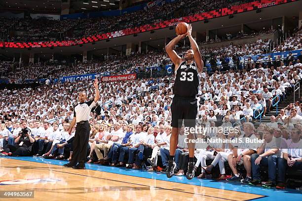 May 31: Boris Diaw of the San Antonio Spurs shoots a three pointer against the Oklahoma City Thunder in Game 6 of the Western Conference Finals...