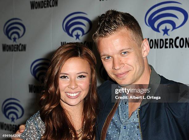 Actress Malese Jow and actor Jesse Luken promote the CW's "Star-Crossed" at WonderCon Anaheim 2014 - Day 1 held at Anaheim Convention Center on April...