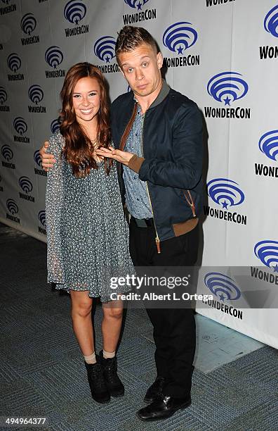 Actress Malese Jow and actor Jesse Luken promote the CW's "Star-Crossed" at WonderCon Anaheim 2014 - Day 1 held at Anaheim Convention Center on April...