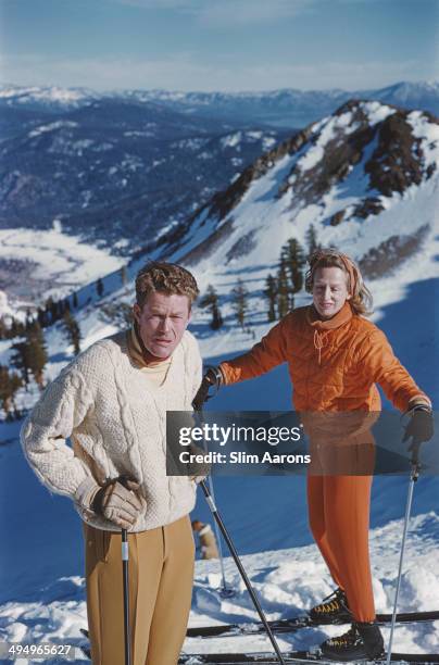 American lawyer and businessman Alexander Cochrane Cushing with his first wife Justine Cushing at the Squaw Valley Ski Resort which he developed in...