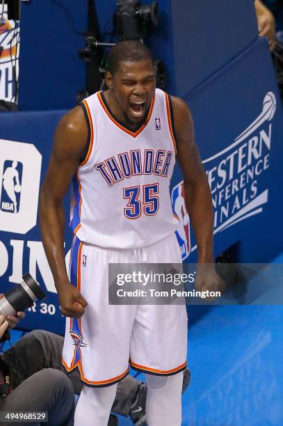 Kevin Durant of the Oklahoma City Thunder celebrates after a play against the San Antonio Spurs in the first half during Game Six of the Western...