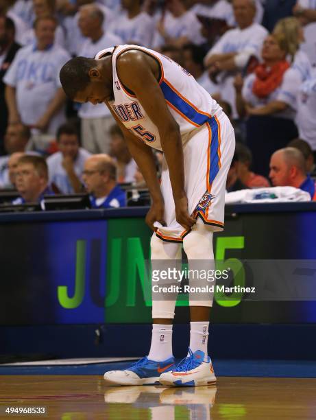 Kevin Durant of the Oklahoma City Thunder waits on the court in the overtime period against the San Antonio Spurs during Game Six of the Western...