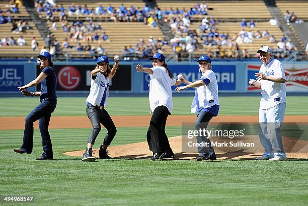 Cast members from film "A League of Their Own" Patti Pelton, Anne Ramsay, Tracy Reiner, Megan Cavanagh and Garry Marshalll throw out the ceremonial...