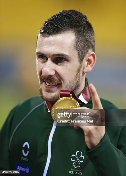 Michael McKillop of Ireland celebrates winning gold in the men's 1500m T37 final during the Evening Session on Day Nine of the IPC Athletics World...