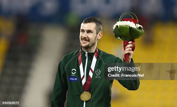 Michael McKillop of Ireland celebrates winning gold in the men's 1500m T37 final during the Evening Session on Day Nine of the IPC Athletics World...