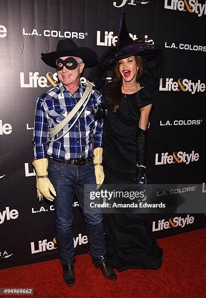 Model Janice Dickinson and Dr. Robert "Rocky" Gerner arrive at the Life & Style Weekly's "Eye Candy" Halloween Bash hosted by LeAnn Rimes at Riviera...