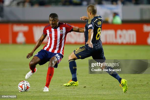 Fred Da Silva of Philadelphia Union in action against Oswaldo Minda of Chivas USA in the second half at StubHub Center on May 31, 2014 in Los...