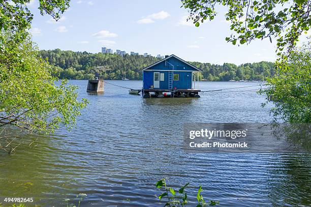 home on the water in stockholm - floating moored platform stock pictures, royalty-free photos & images
