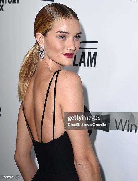 Rosie Huntington-Whiteley arrives at the amfAR's Inspiration Gala Los Angeles at Milk Studios on October 29, 2015 in Hollywood, California.