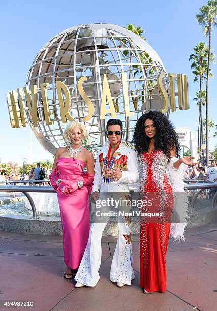 Charissa Thompson, Mario Lopez and Tracey Edmonds attend "Extra" at Universal Studios Hollywood on October 30, 2015 in Universal City, California.