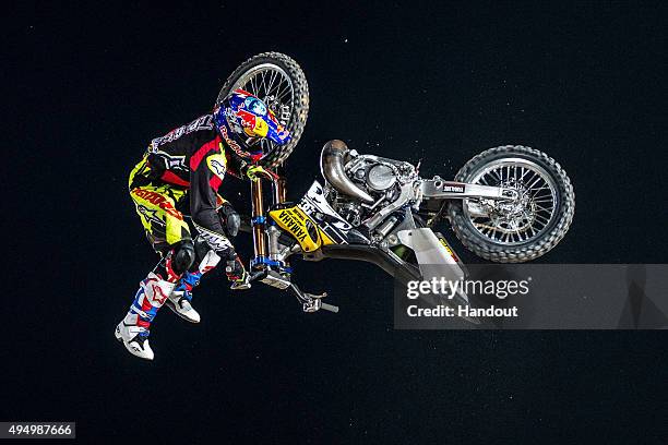 In this handout image provided by Red Bull, Tom Pages of France performs during the final stage of the Red Bull X-Fighters World Tour 2015 on October...