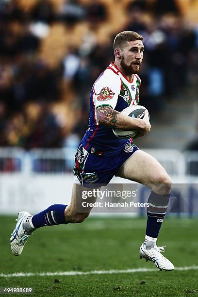 Sam Tomkins of the Warriors charges forward during the round 12 NRL match between the New Zealand Warriors and the Newcastle Knights at Mt Smart...