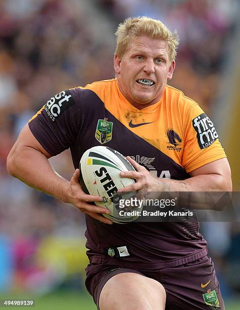 Ben Hannant of the Broncos runs with the ball during the round 12 NRL match between the Brisbane Broncos and the Manly-Warringah Sea Eagles at...