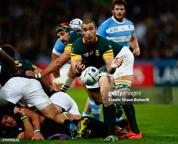 Ruan Pienaar of South Africa dispatches the ball during the 2015 Rugby World Cup Bronze Final match between South Africa and Argentina at the Olympic...