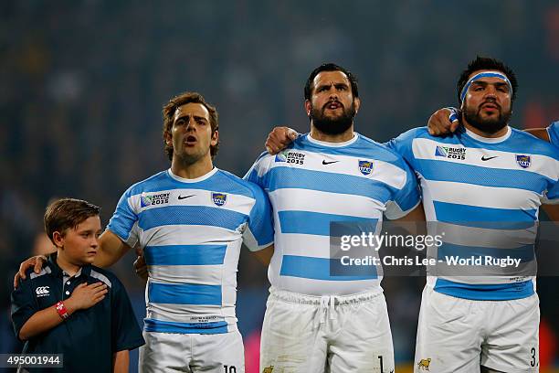 Mascot lines up with Nicolas Sanchez, Juan Figallo and Ramiro Herrera of Argentina prior to the 2015 Rugby World Cup Bronze Final match between South...