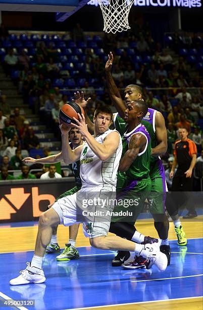 Luke Harangody of Darussafaka Dogus is in action against Jamar Smith of Unicaja Malaga during the Turkish Airlines Euroleague's match of Group D at...