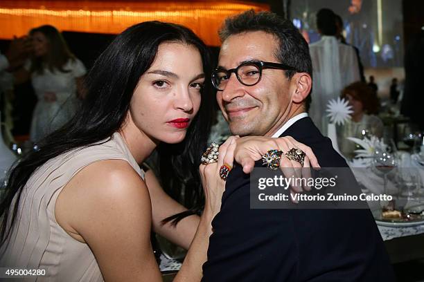 Mariacarla Boscono and CEO of Yoox Federico Marchetti attend the Gala event during the Vogue Fashion Dubai Experience 2015 at Armani Hotel Dubai on...