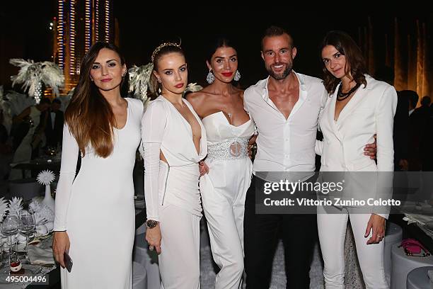 Designer Philipp Plein, Xenia Tchoumitcheva and guests attend the Gala event during the Vogue Fashion Dubai Experience 2015 at Armani Hotel Dubai on...