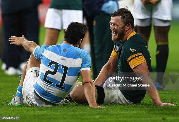 Duane Vermeulen of South Africa and Martin Landajo of Argentina in discussion after the 2015 Rugby World Cup Bronze Final match between South Africa...