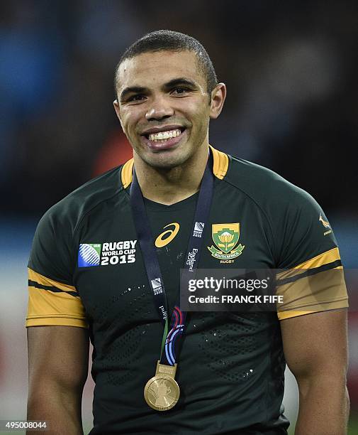 South Africa's wing Bryan Habana smiles after winning the bronze medal match of the 2015 Rugby World Cup between South Africa and Argentina at the...