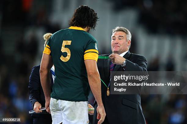 President Jason Leonard presents Victor Matfield of South Africa with his bronze medal after the 2015 Rugby World Cup Bronze Final match between...