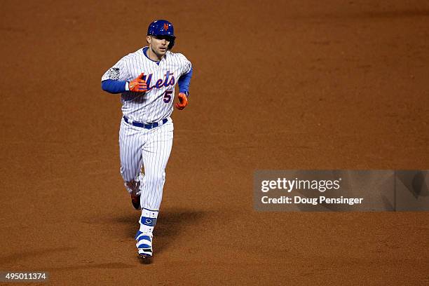 David Wright of the New York Mets rounds the bases after hitting a two run home run in the first inning against the Kansas City Royals during Game...