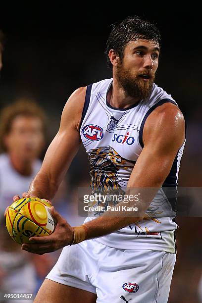 Josh Kennedy of the Eagles looks to pass the ball during the round 11 AFL match between the West Coast Eagles and the North Melbourne Kangaroos at...