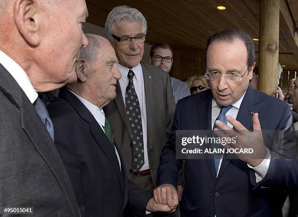 French President Francois Hollande meets with WWII veterans on June 1 in Asnelles during a visit ahead of commemorations marking the 70th anniversary...