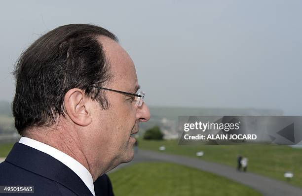 French President Francois Hollande stands near Gold Beach, one of the five designated beaches that were used during the D-Day landing, on June 1 in...