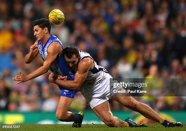 Shannon Hurn of the Eagles tackles Robin Nahas of the Kangaroos during the round 11 AFL match between the West Coast Eagles and the North Melbourne...