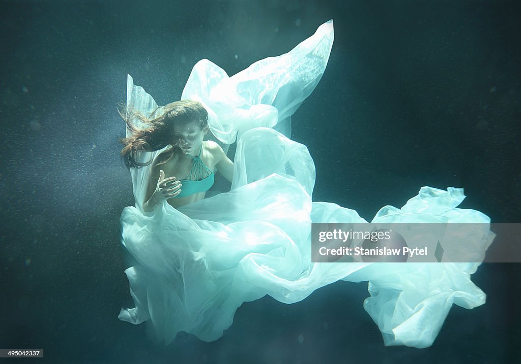 Girl flying underwater