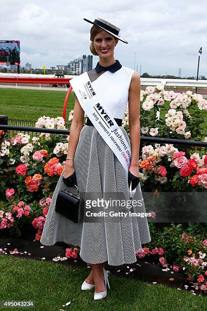 Myer Fashions on the Field Women's Racewear winner Courtney Moore poses in the Fashion on the Field enclosure on Victoria Derby Day at Flemington...