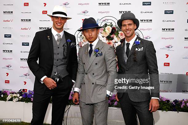 Myer Fashions on the Field Men's Racewear winner Pepe Sithiphon Siyavong , second place Brock Cross and first place Chris Burt-Allan pose on Victoria...